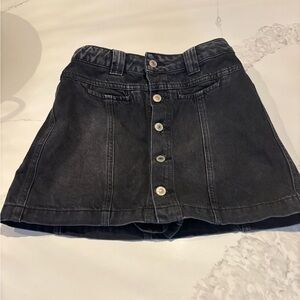 Free people black Jean skirt with built in shorts. Size  26.